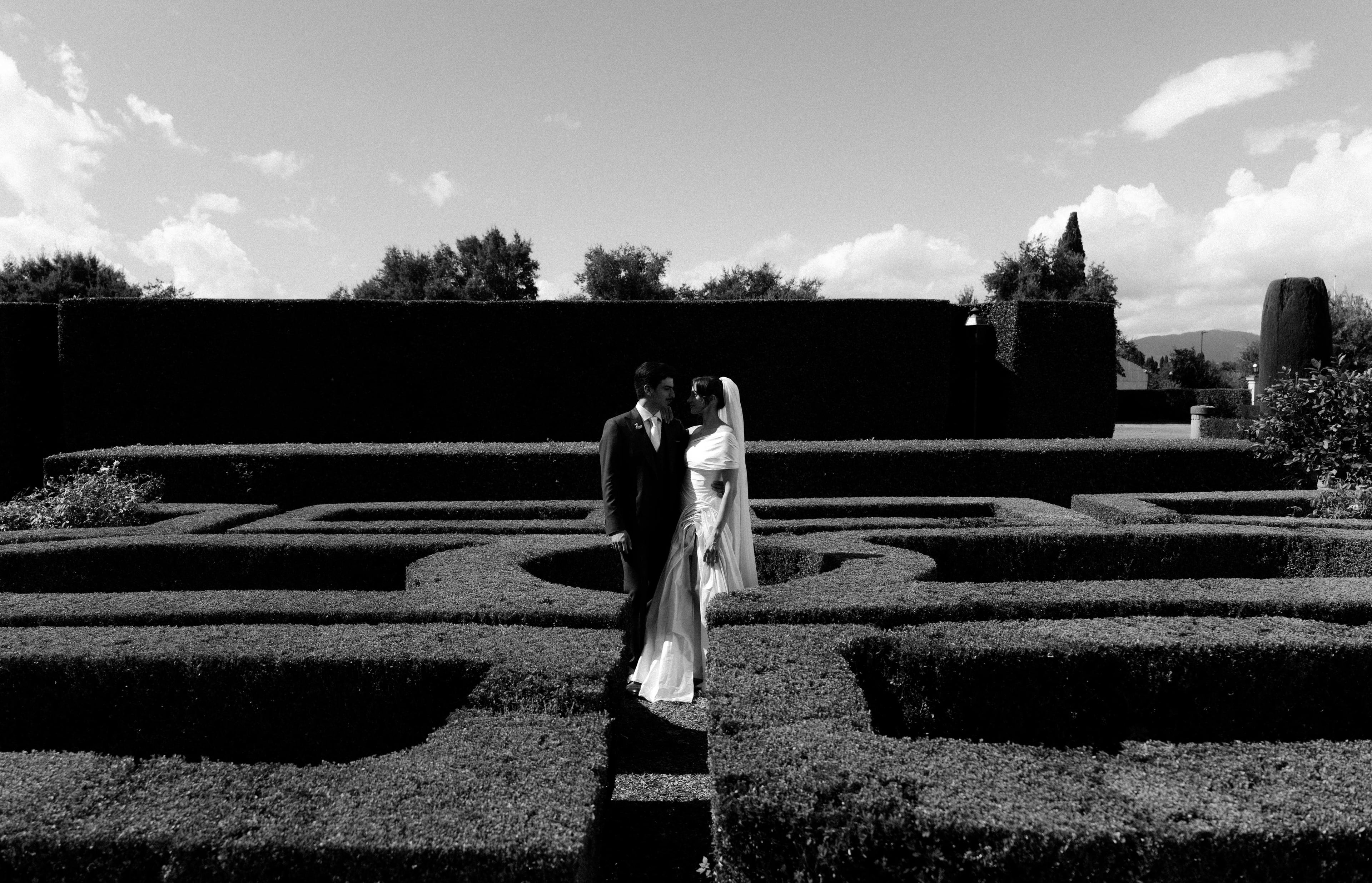 Wedding couple in a garden maze